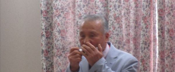 １２月地域交流会『ハーモニカ演奏』